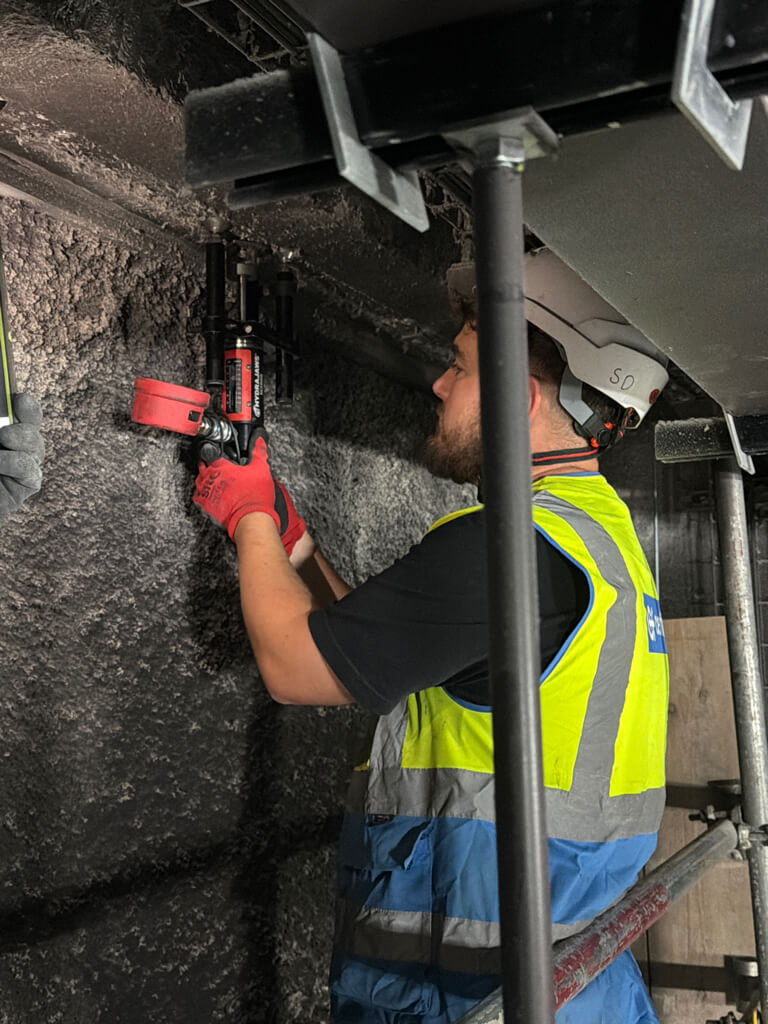Certifix engineer operating a Hydrajaws M200 whilst on site at a College in the UK